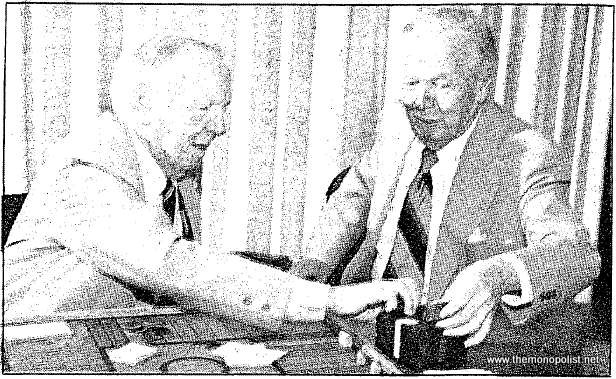 The Thuns play Monopoly on their 1920s game board. Notice the poker chips.