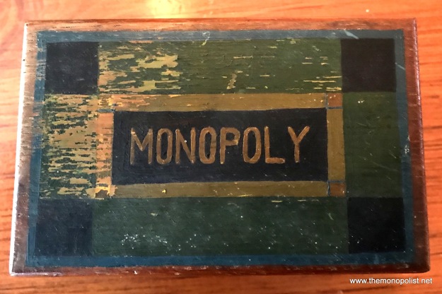 The wooden utensils box identifies this game as Monopoly.