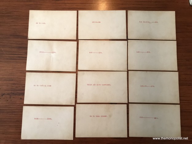 There are 12 more cards, which appear to be a second set of Chance cards. This is even more evidence that these pieces are from two slightly different games.