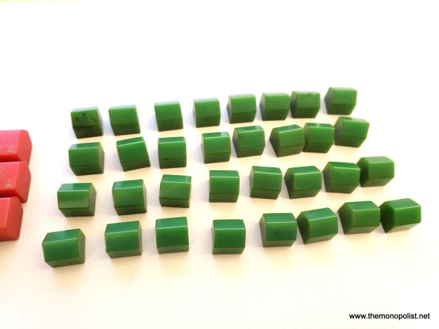 The first plastic houses used with deluxe US and UK Monopoly sets in the late 1930s.